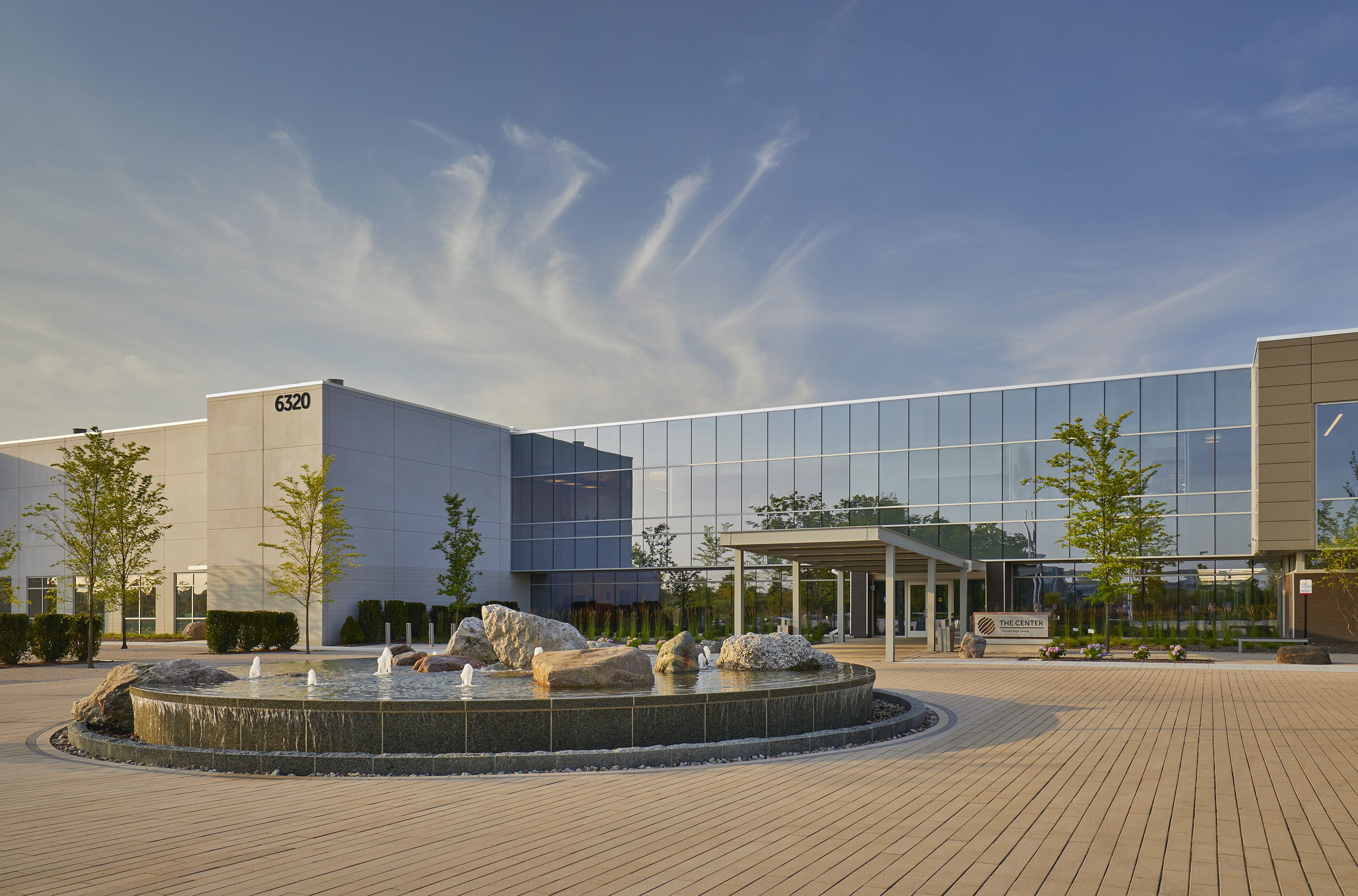 The Center for Innovation The Center for Innovation, a modern corporate and research facility featuring a glass façade, landscaped entry plaza, and water feature in Indianapolis, Indiana
